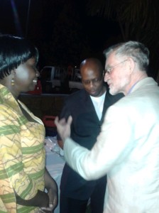 Emily Drani and John De Coninck of CCFU sharing a light moment with a representative from The Madvani foundation Uganda.