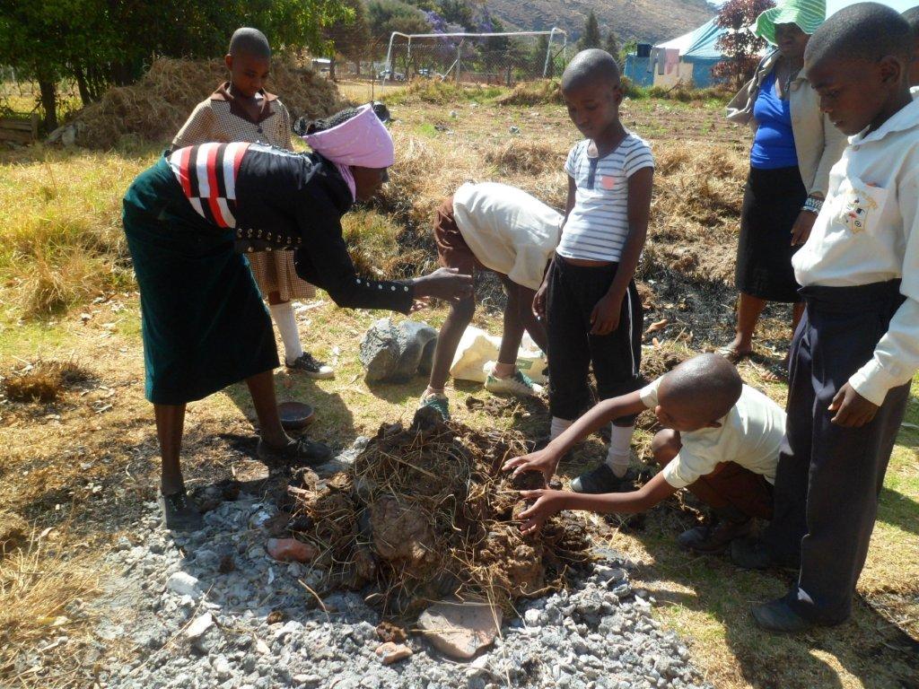 Pupils from Nyamuka Primary fire their pots