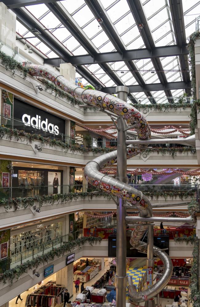 Five-storey stainless steel slide installed in Shanghai shopping mall