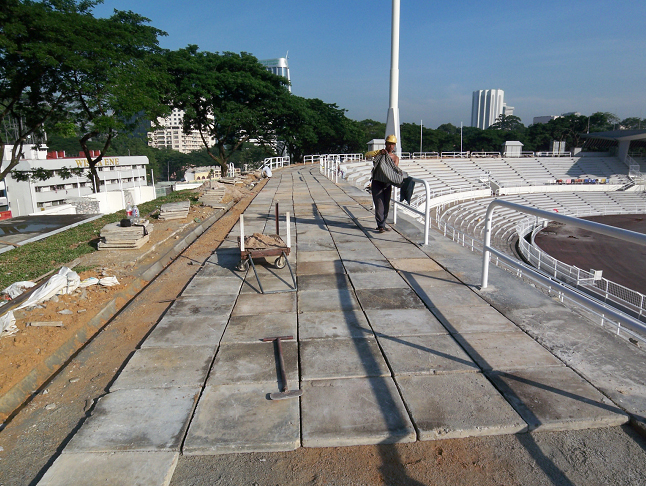 Reinstating the original flagstones which had been removed for safekeeping, Badan Warisan Malaysia